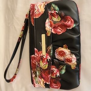 Juicy Couture faux leather floral wristlet